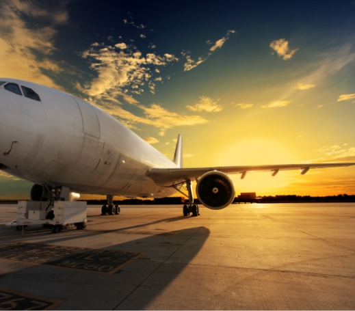 Commercial aircraft at sunset